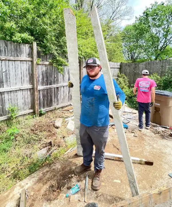two Junk Galaxy workers working on a shed removal project